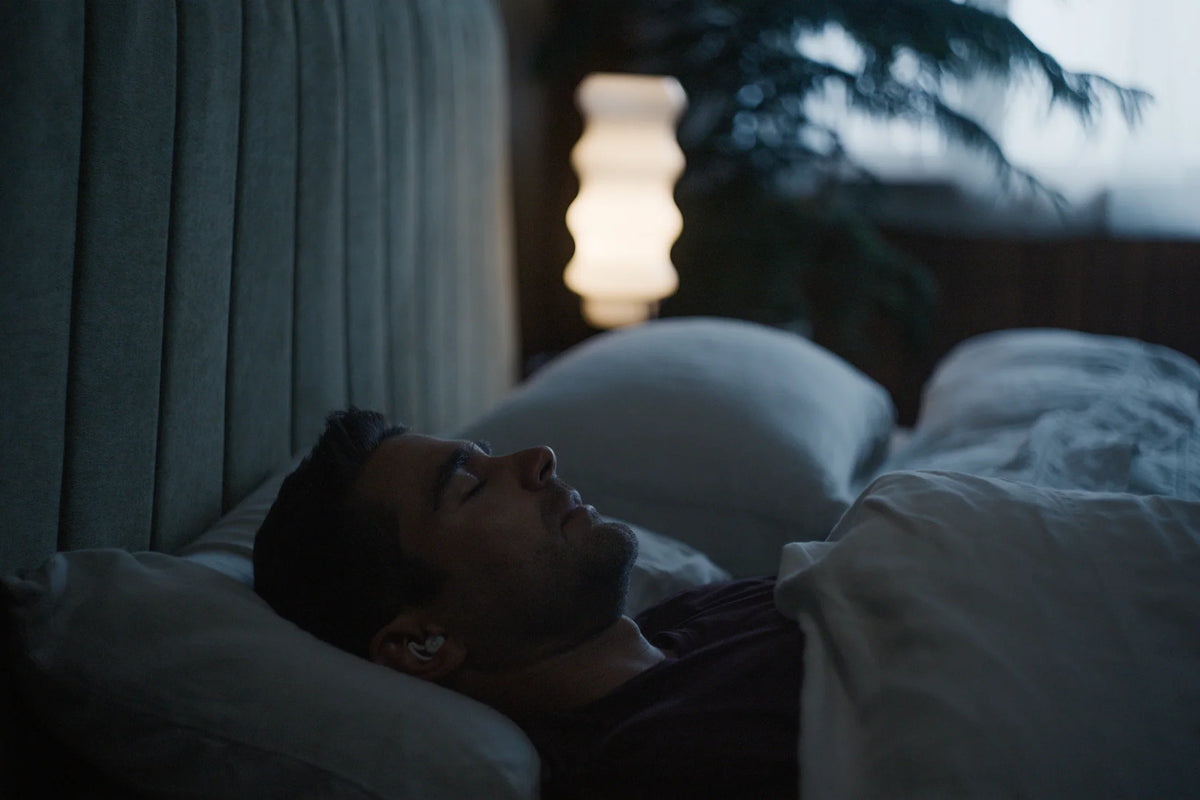 Man resting comfortably in bed 